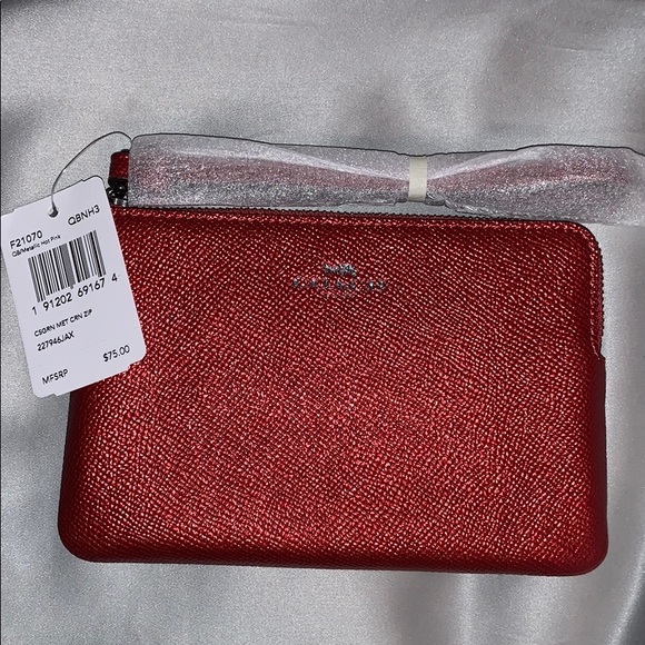 Coach Handbags - Coach corner zip Metallic red wristlet